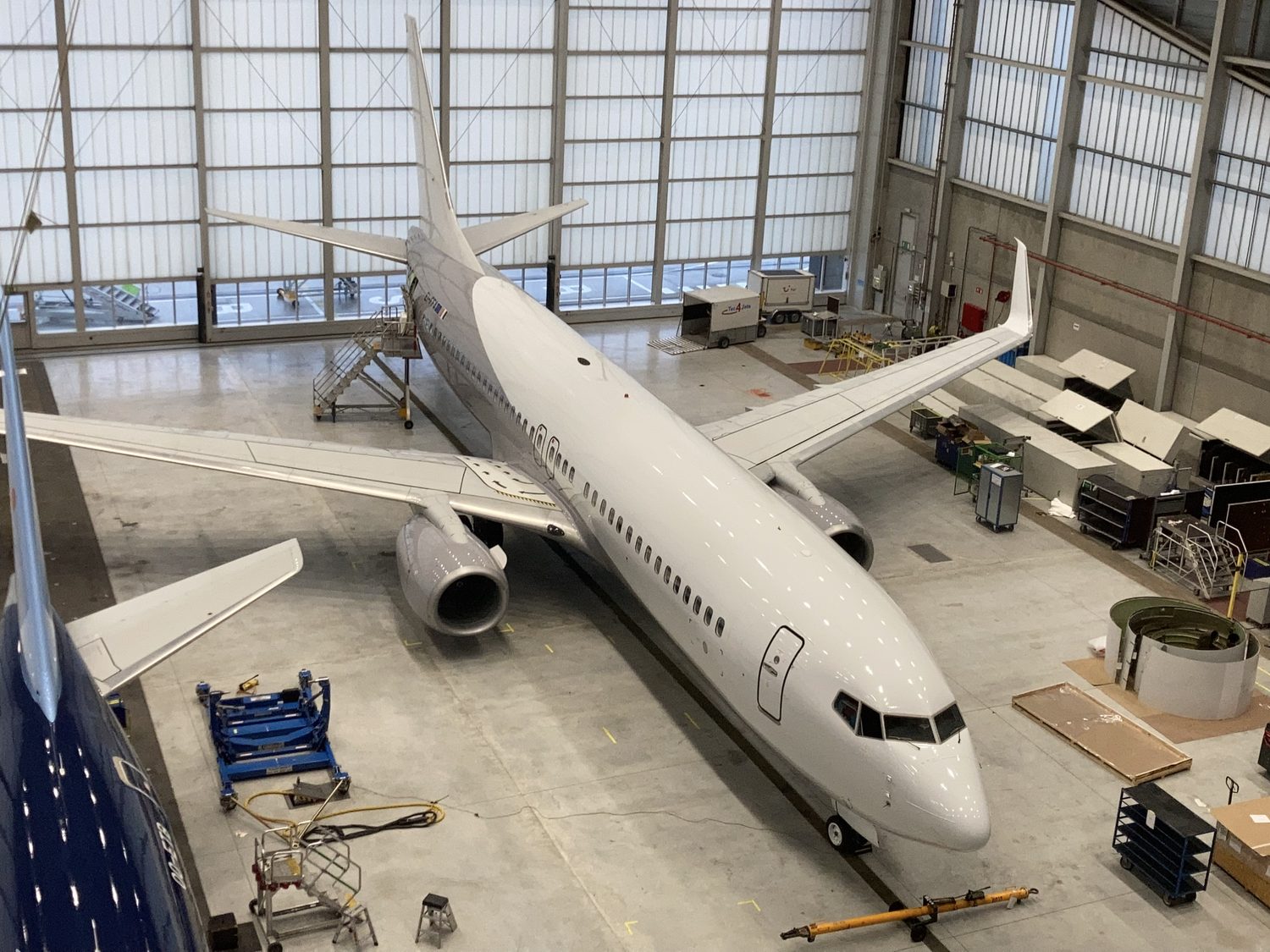 Aircraft under maintenance in a hangar — a controlled programme environment